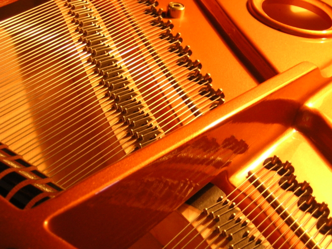the inside of a grand piano