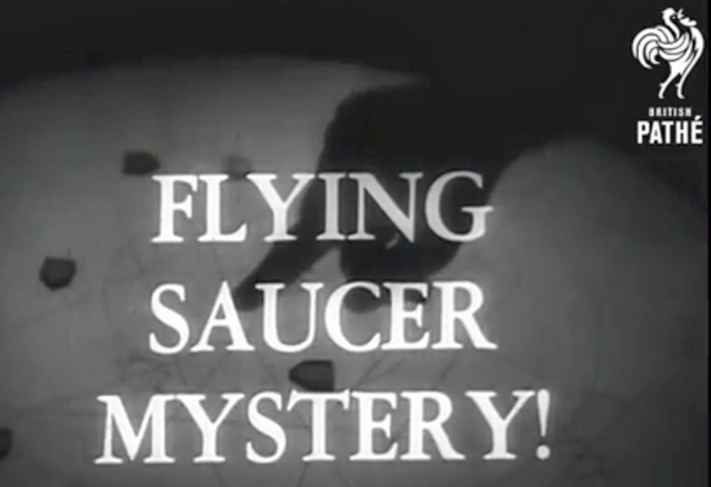 A black and white screenshot with the words Flying Saucer Mystery. 